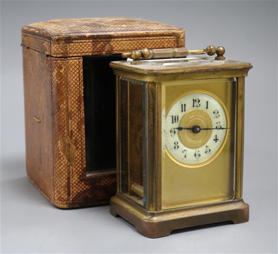 A carriage clock, case and key